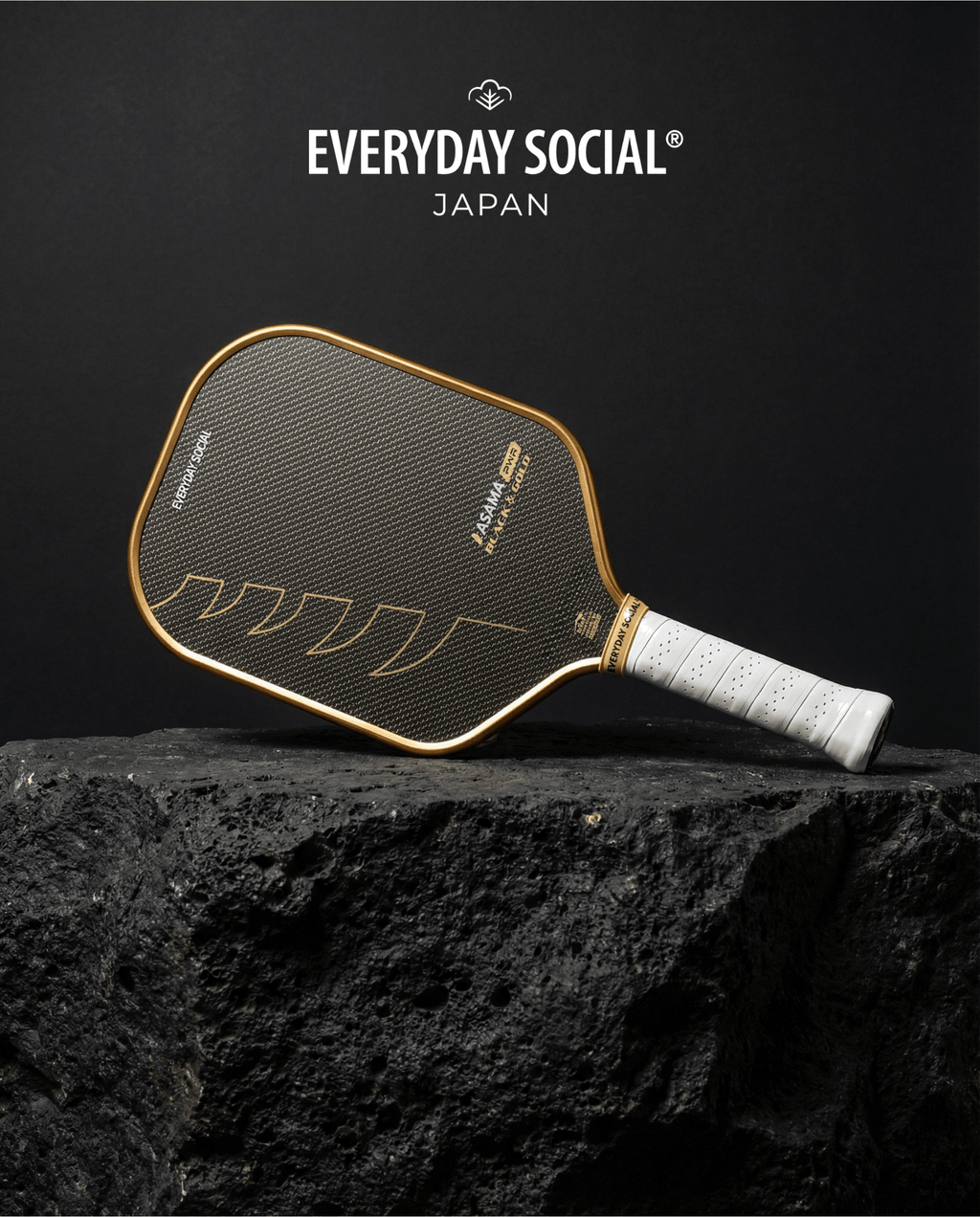 Asama Black & Gold PWR paddle on stone